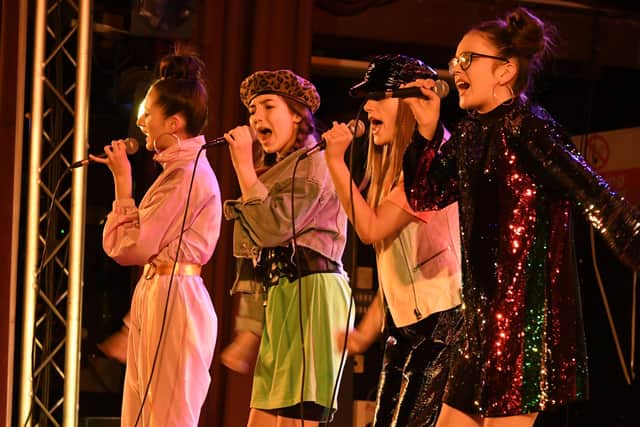 The Dolls performing at the Borough Hall in 2019.