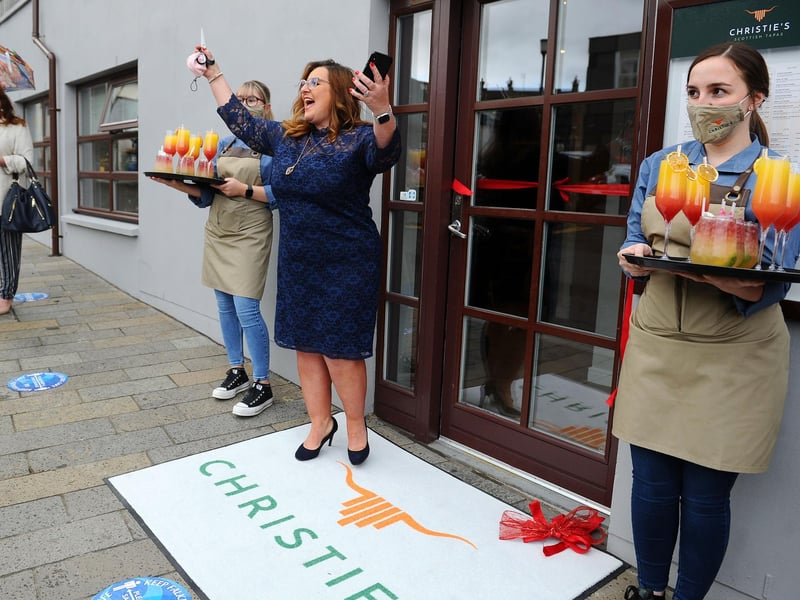 Barbara Bryceland helps with the ribbon cutting ceremony at Christie's, Falkirk. Picture: Michael Gillen.