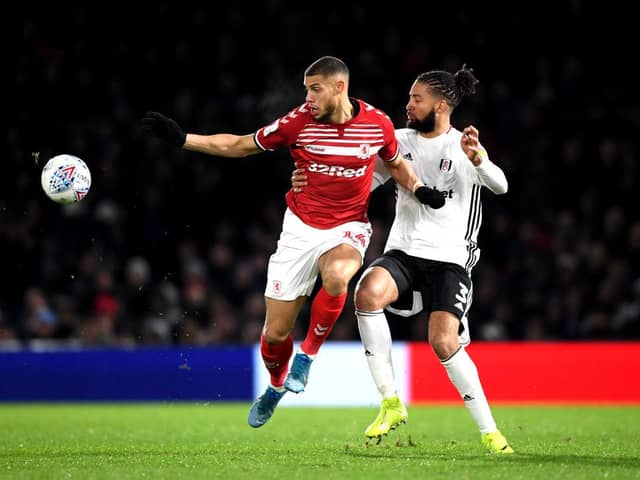 LONDON, ENGLAND - JANUARY 17: Michael Hector of Fulham and Rudy Gestede of Middlesbrough  during the Sky Bet Championship match between Fulham and Middlesbrough at Craven Cottage on January 17, 2020 in London, England. (Photo by Alex Davidson/Getty Images)