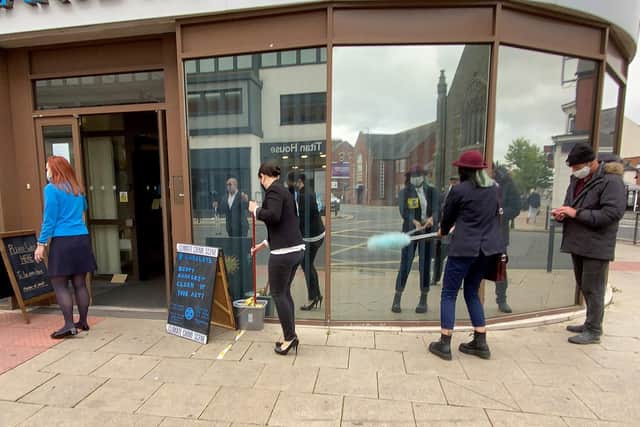 Extinction Rebellion members cleaning Barclays Bank, York road, Hartlepool. Picture by Frank Reid.