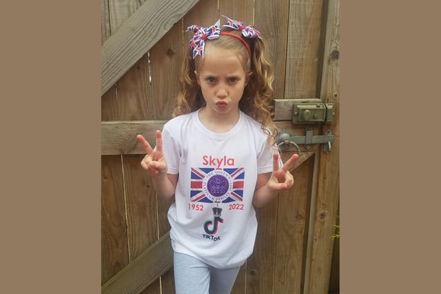 Eight-year-old Skyla shows off her Jubilee outfit.
