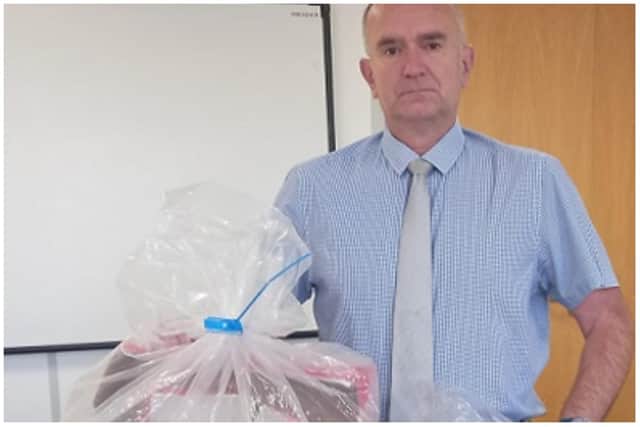Hartlepool Borough Council trading standards and licensing manager Ian Harrison with some of the seized vapes.