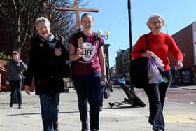 Bernadette Malcolmson (centre) with Geraldine Martin (left) and Susan Atkinson from St Mary's Church on a previous year's Walk of Witness. Picture by FRANK REID