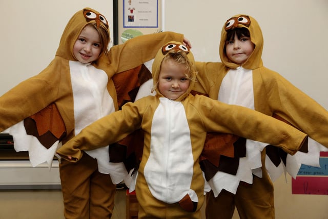 Pupils Darcey, Freya and Theo take part in the school's 2015 nativity dress rehearsal.
