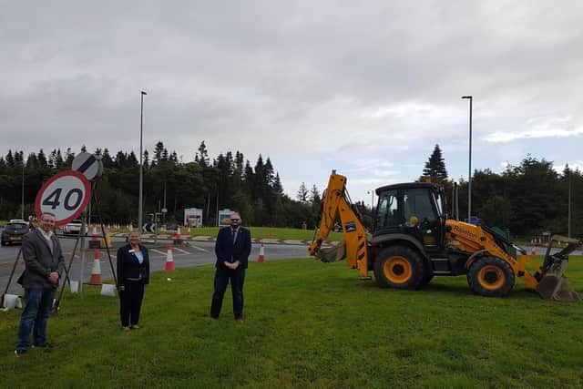 From left to right, Councillors John Tennant, Brenda Loynes and Mike Young at the Meadows roundabout.