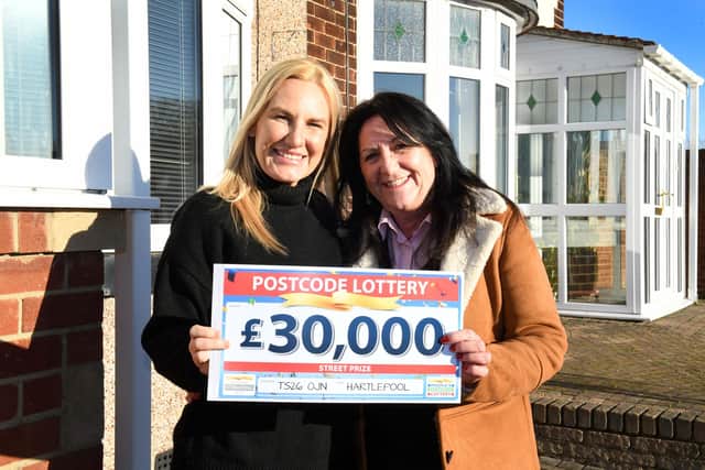 Jane Short (right), pictured with daughter Kirsty, is planning to celebrate her 60th birthday "in style" after scooping the cash prize.