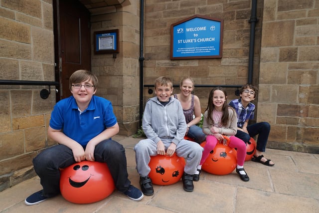 Children from St Luke's Church have fun on space hoppers ahead of the Space Oddity garden party in 2015.