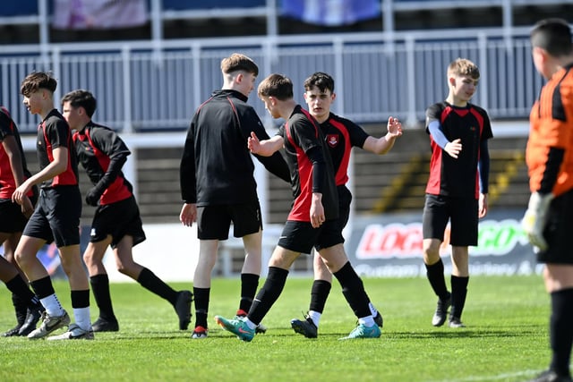 English Martyrs, red and black, versus Dyke House in the year nine boys' cup final. Picture by FRANK REID