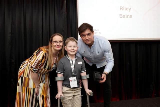 Riley with mum Sarah Kidson and Gladiator Apollo at the Brave Hearts of the North East Awards at St James's Park.