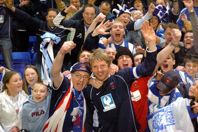 Ritchies Humphreys celebrates with fans after the dramatic victory over Tranmere Rovers in 2005.