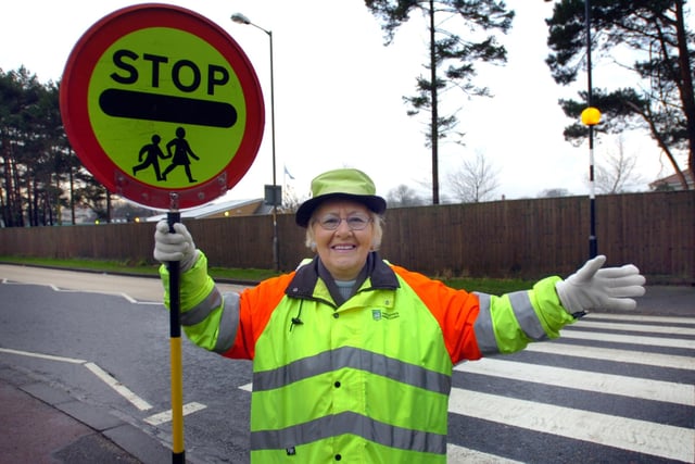 Lollipop lady Pam Robertson stands at the crossing near the cricket club in 2009.CATCHLINE HM0609LOLLYPOP