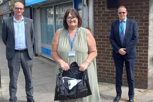 Left to right: Safer Hartlepool Partnership chair Councillor Shane Moore, Harbour chief executive Lesley Gibson with one of the bags and Tees Valley CCG chief officer Dave Gallagher.