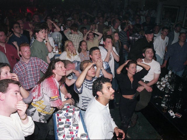 An emotional scene at the Sports Bar in Park Road in 1996 where England supporters had gathered to watch the Euros semi final match against Germany.