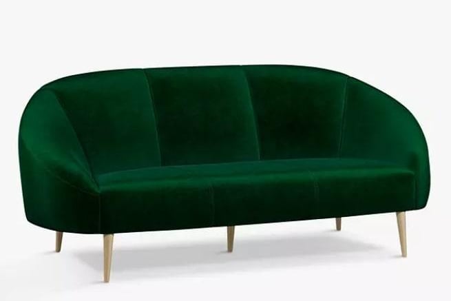 This wee number does what it says on the tin - it’s curved, comfy-looking and the emerald-green hue is very “in” in interior design circles, our sources tell us. Also, this is a huge discount down from over £1,000.