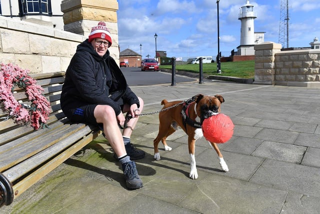 Bruno with his ball and owner Steve Cox ready to play at the Headland.