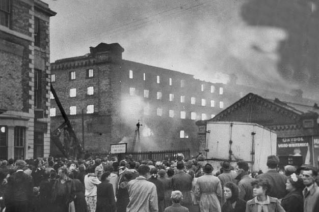 A busy scene in Church Street as onlookers watch the Match Factory fire in 1954.