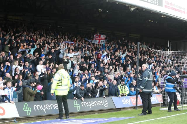 Hartlepool United supporters celebrated a significant win over Grimsby Town. (Photo: Mark Fletcher | MI News)