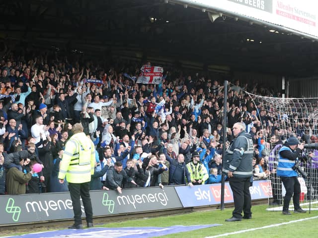 Hartlepool United supporters celebrated a significant win over Grimsby Town. (Photo: Mark Fletcher | MI News)