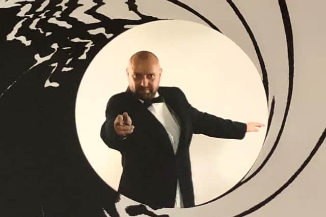 Phil Whitfield in character as James Bond.