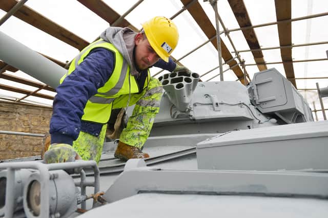 Jake Sleeman from Group Industrial UK Ltd working on a Chieftain Tank undergoing restoration at The Heugh Battery Museum. Picture by FRANK REID