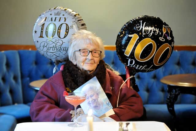 Hilda Maguire with a card from the Queen as she celebrates  her 100th birthday. Picture by FRANK REID