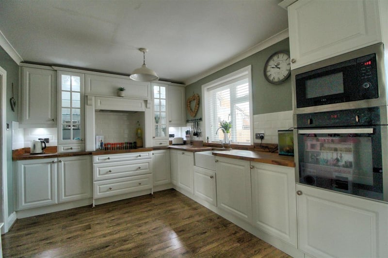 The kitchen benefits from a number of integrated appliances and French doors to the rear.

Photo: Zoopla