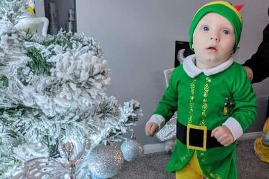 Elliot, age 11 months, ready to celebrate Christmas.
