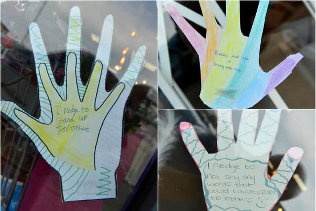 Some of the messages displayed on the salon's window.
