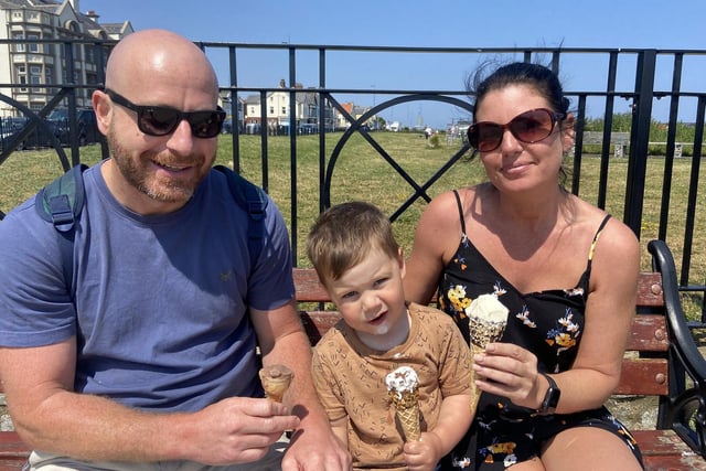 From left, Steven, Otto and Danielle cooling down with their ice creams at Seaton Carew. Picture by FRANK REID