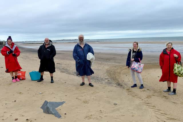 Five swimmers are all set for their swim in the North Sea. Picture by Frank Reid
