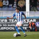 Hartlepool United midfielder Tom Crawford went off injured early during the friendly with Hibernian. (Credit: Mark Fletcher | MI News)