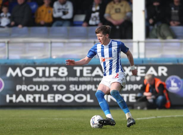 Hartlepool United midfielder Tom Crawford went off injured early during the friendly with Hibernian. (Credit: Mark Fletcher | MI News)