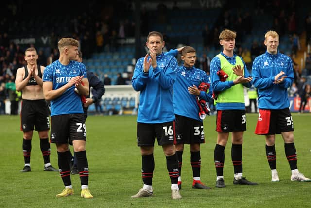 Hartlepool United players and staff show their appreciation to supporters following the 1-1 draw with Stockport County. (Photo: Chris Donnelly | MI News)