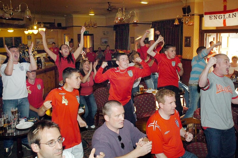 England fans celebrate in The Woodcutter as David Beckham scores the winner against Ecuador in the 2006 World Cup last 16 clash.