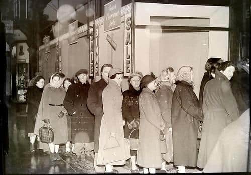 People queuing for Binns Sale in 1954.