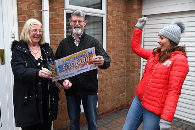 Hazel and David McCombe with Judie McCourt from the People's Postcode Lottery