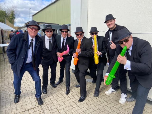 Poolies bash out a tune outside the Dorking ground in 2024.