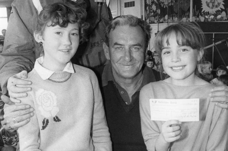 Pupils Lesley Clark and Jayne Bushnall hand over a cheque for £90 to the Hartlepool branch of the Royal National Lifeboat Institution in 1986.