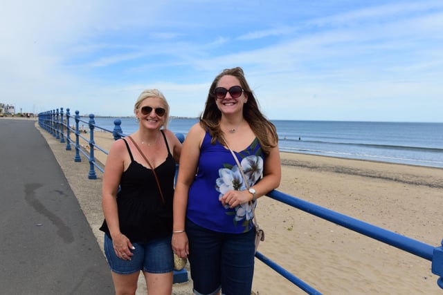 Anna Bainbridge (left) and Amy Turley of Durham taking advantage of the warm weather at Seaton Carew on Monday