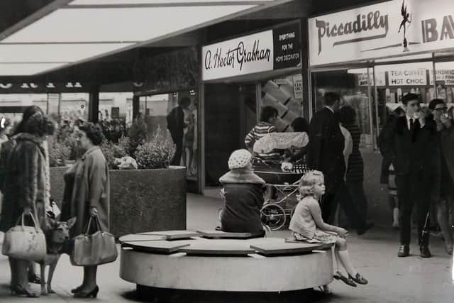 Hartlepool in 1974 and lots of shoppers milling around the Piccadilly Bar in Middleton Grange Shopping Centre.