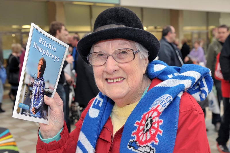 Hartlepool United supporter Doreen Mee with her signed copy of Ritchie Humphrey's testimonial brochure in 2011.
