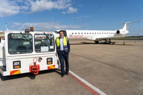 Mayor Houchen at Teesside Airport with an aircraft support tug