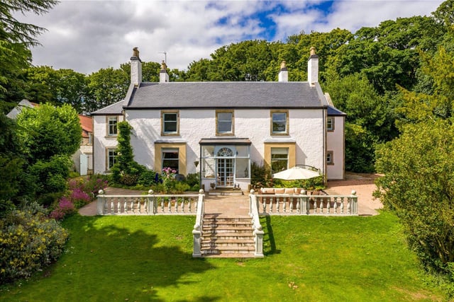 Refurbished Georgian farmhouse with ruined castle in rural location close to Kirkcaldy. Offers over £1,200,000.