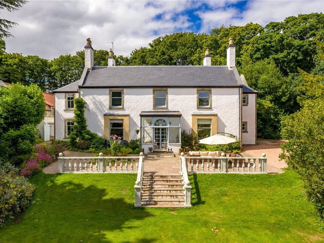 Refurbished Georgian farmhouse with ruined castle in rural location close to Kirkcaldy. Offers over £1,200,000.