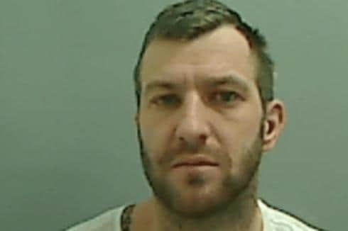 Carl Jones admitted burglary with violence and breaching a court order.
