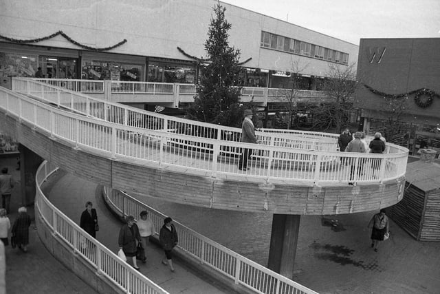 Who is old enough to remember the shopping centre's curly ramp seen here with a Christmas protruding through the centre?