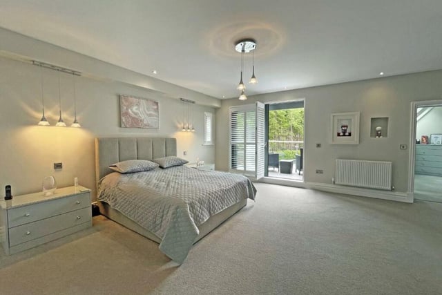 The master bedroom in this home features a full-size bathroom, fitted dressing room and terrace overlooking the garden.