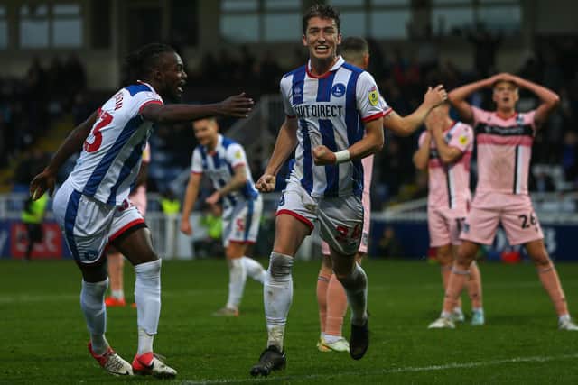 Hartlepool United's Alex Lacey celebrates scoring the equaliser against Grimsby Town. (Credit: Michael Driver | MI News)