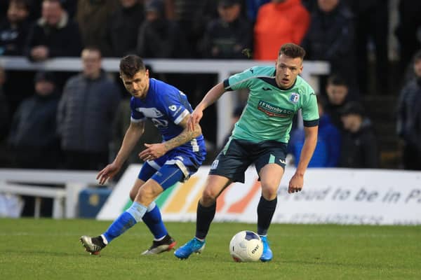 Gavan Holohan of Hartlepool United in action with Tom White during the Vanarama National League match between Hartlepool United and Barrow at Victoria Park, Hartlepool on Saturday 28th December 2019. (Credit: Mark Fletcher | MI News)