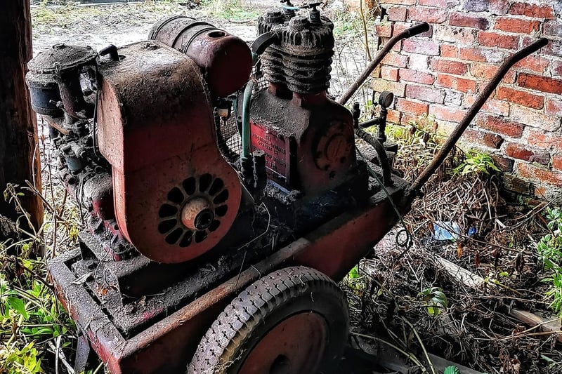An old farm machine left behind.